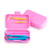 Orthodontic set for care of braces with a monobundle brush, pink